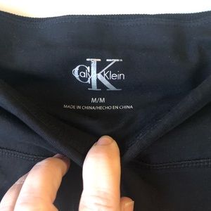 Calvin Klein stretch pants with ankle zippers